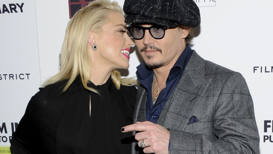 Der er ingen tvivl om at der er god kemi mellem Amber Heard og Johnny Depp. (Foto: AP/Evan Agostini).