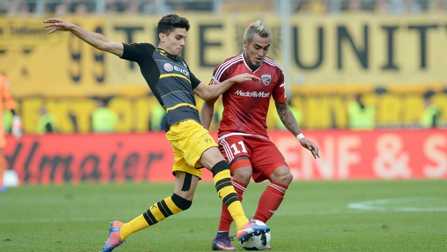 Marc Bartra og Borussia Dortmund måtte takke holdkammeraten Christian Pulisic for at sikre det ene point med et mål i overtiden. Foto: AP