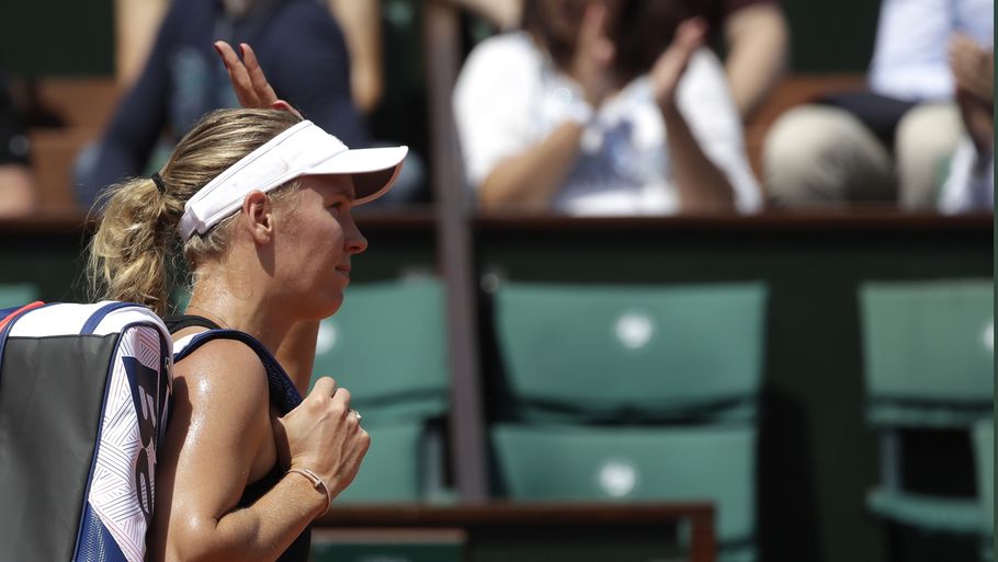 Wozniacki vinker farvel til muligheden for at vinde sin anden grand slam i år. Foto: AP