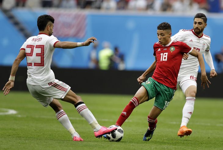 Amine Harit blev (th) kampens spiller mod Iran i Marokkos første kamp ved VM. Foto: AP