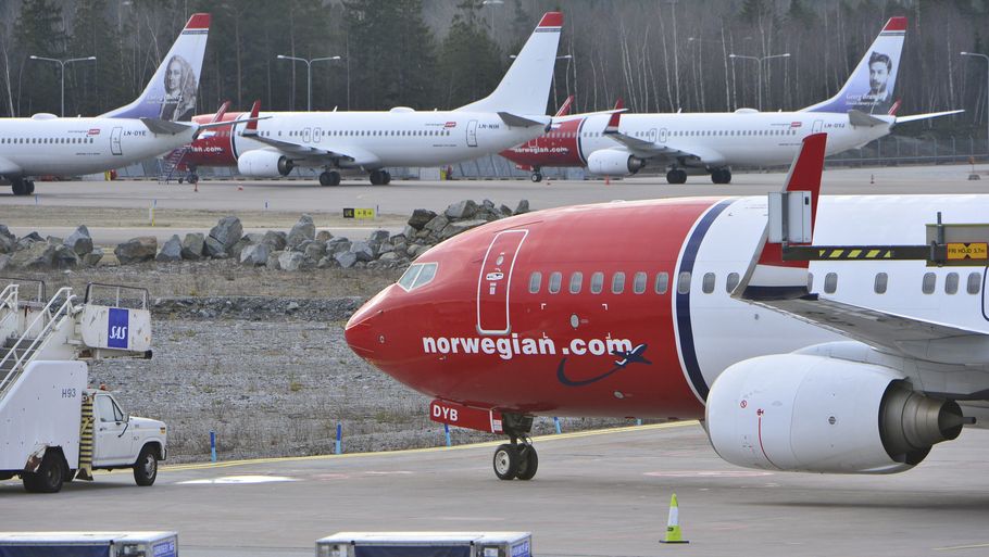 Norwegian er blandt andet et af de flyselskaber, som nu kvitter kravet om mundbind. Arkivfoto: TT News Agency/Ritzau Scanpix
