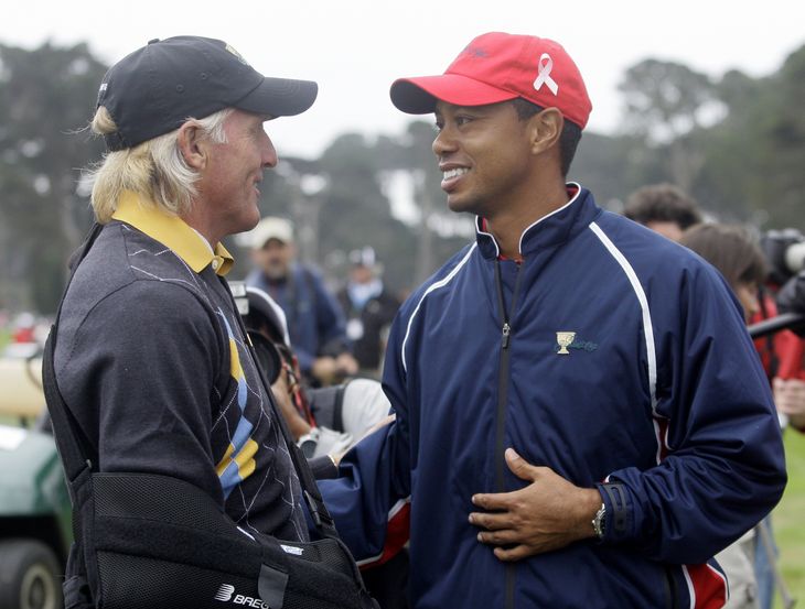 Greg Norman og Tiger Woods mens alting var fryd og gammen i 2009. Foto: Marcio Jose Sanchez/Ritzau Scanpix